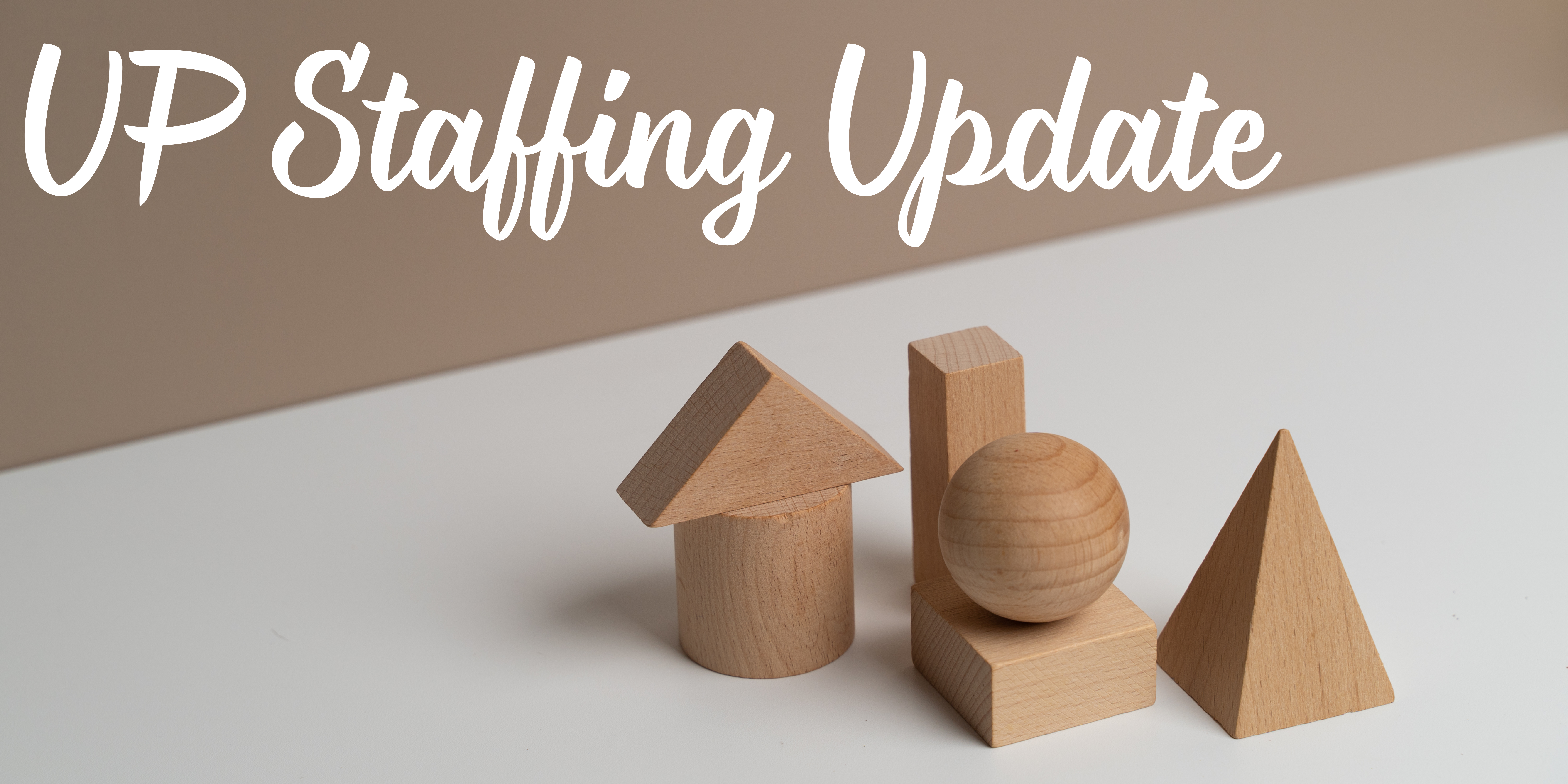 image of brown building blocks on gray background with white lettering above reading UP Staffing Update